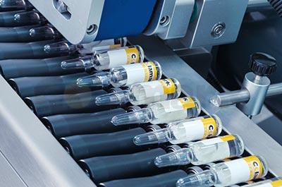 A205R High Speed Horizontal Labeling and Tray Insertion Solution